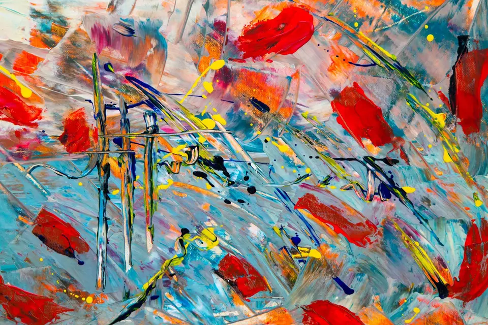 Abstract painting with red, blue, and yellow brushstrokes
